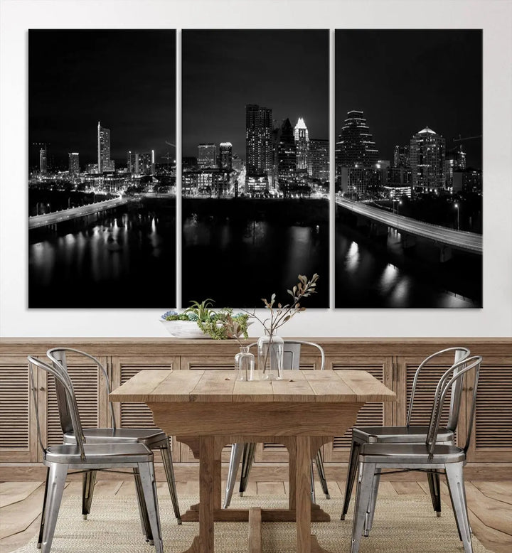 The Austin City Skyline Black and White Wall Art Cityscape Canvas Print, a stunning triptych of a nighttime cityscape printed on museum-quality canvases, adorns the wall. This hand-assembled framed artwork exudes elegance and features a UV-protective coating to maintain the city's captivating allure.