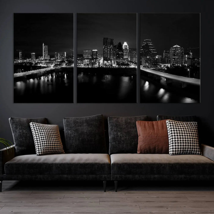 The Austin City Skyline Black and White Wall Art Cityscape Canvas Print, a stunning triptych of a nighttime cityscape printed on museum-quality canvases, adorns the wall. This hand-assembled framed artwork exudes elegance and features a UV-protective coating to maintain the city's captivating allure.