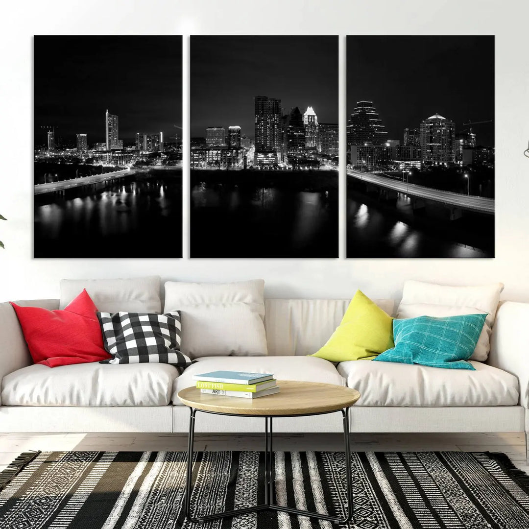 The Austin City Skyline Black and White Wall Art Cityscape Canvas Print, a stunning triptych of a nighttime cityscape printed on museum-quality canvases, adorns the wall. This hand-assembled framed artwork exudes elegance and features a UV-protective coating to maintain the city's captivating allure.