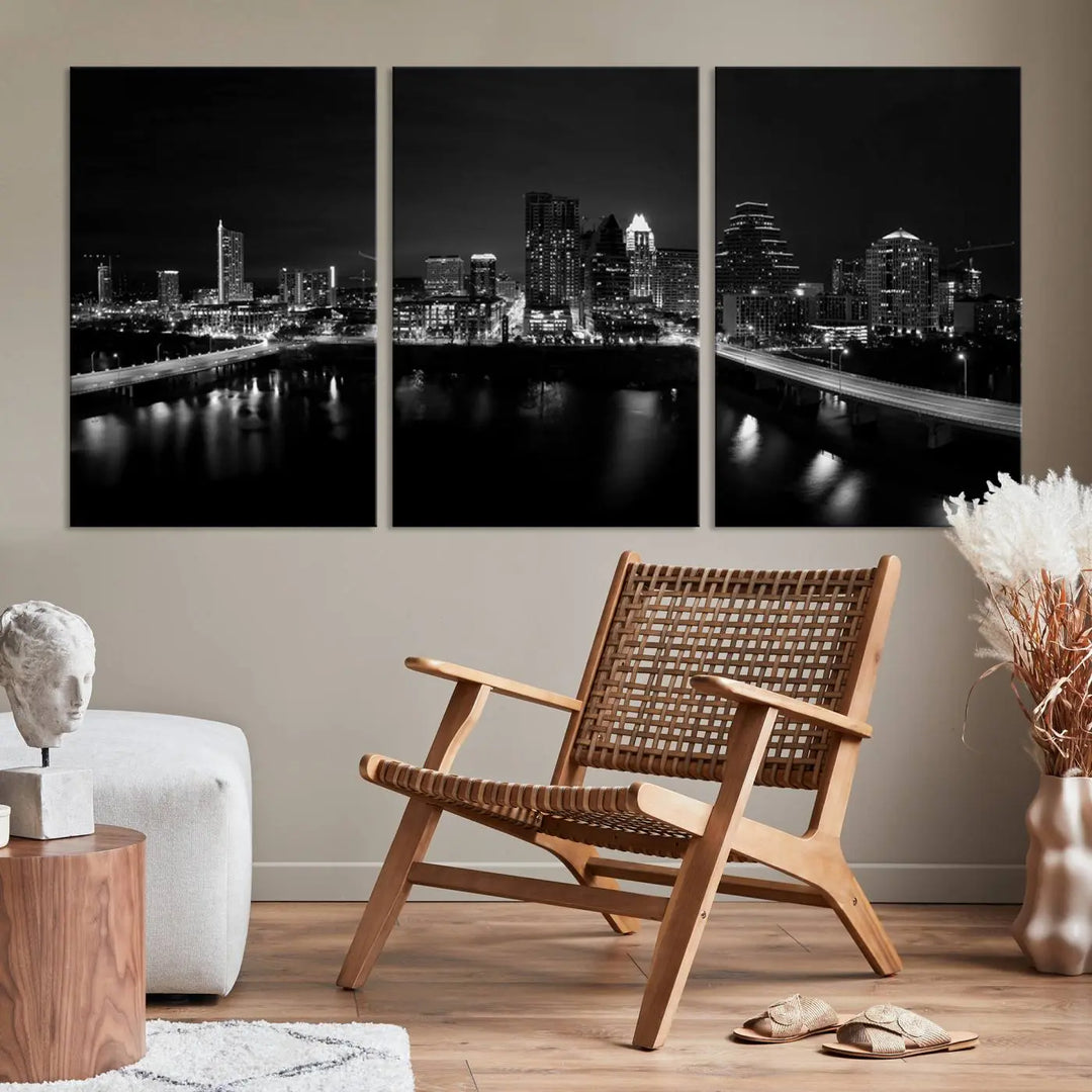 The Austin City Skyline Black and White Wall Art Cityscape Canvas Print, a stunning triptych of a nighttime cityscape printed on museum-quality canvases, adorns the wall. This hand-assembled framed artwork exudes elegance and features a UV-protective coating to maintain the city's captivating allure.