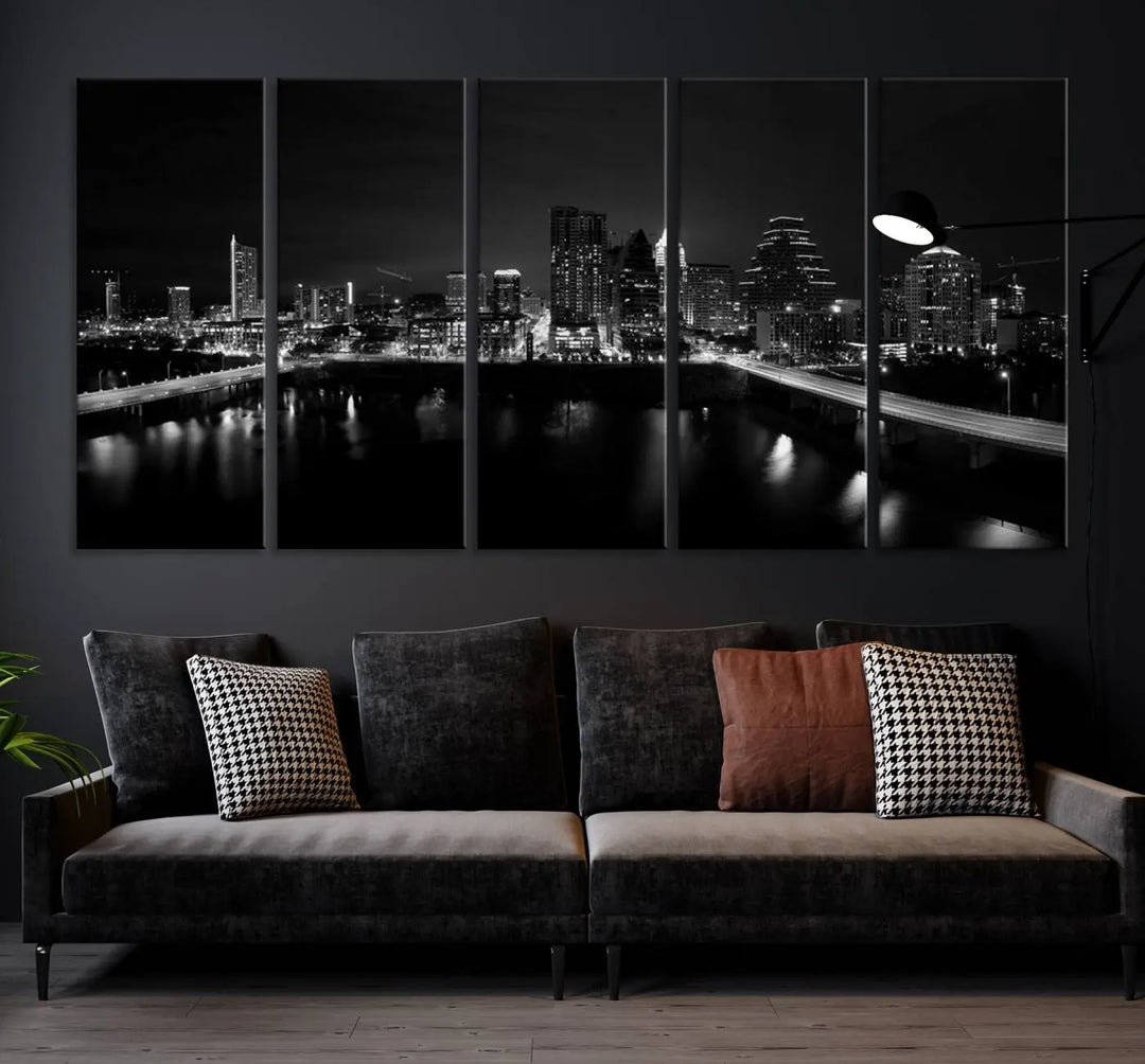 The Austin City Skyline Black and White Wall Art Cityscape Canvas Print, a stunning triptych of a nighttime cityscape printed on museum-quality canvases, adorns the wall. This hand-assembled framed artwork exudes elegance and features a UV-protective coating to maintain the city's captivating allure.