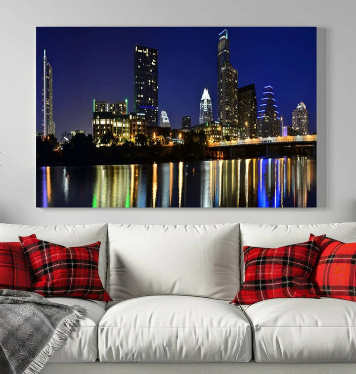 The Austin Lights Night Blue Skyline Cityscape View wall art canvas print features a city skyline and river on museum-quality canvas. It offers the perfect ready-to-hang solution that transforms any room into an urban oasis.