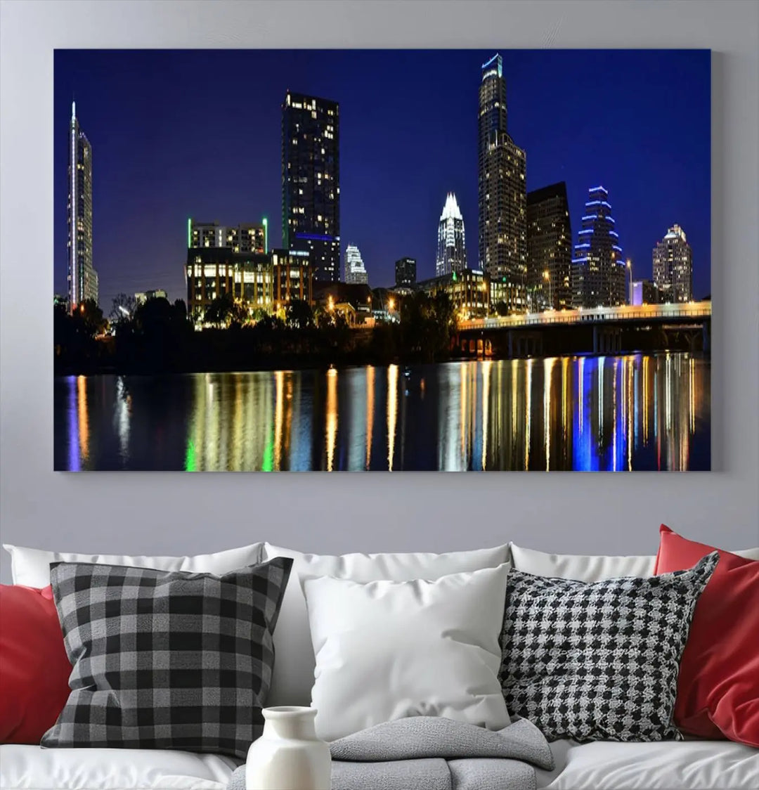 The Austin Lights Night Blue Skyline Cityscape View wall art canvas print features a city skyline and river on museum-quality canvas. It offers the perfect ready-to-hang solution that transforms any room into an urban oasis.