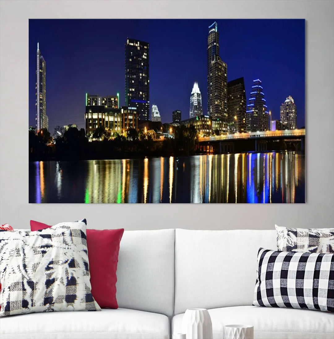 The Austin Lights Night Blue Skyline Cityscape View wall art canvas print features a city skyline and river on museum-quality canvas. It offers the perfect ready-to-hang solution that transforms any room into an urban oasis.