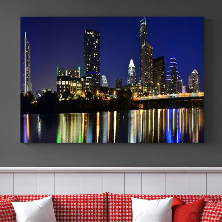 The Austin Lights Night Blue Skyline Cityscape View wall art canvas print features a city skyline and river on museum-quality canvas. It offers the perfect ready-to-hang solution that transforms any room into an urban oasis.