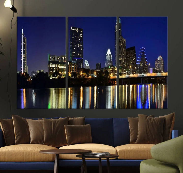 The Austin Lights Night Blue Skyline Cityscape View wall art canvas print features a city skyline and river on museum-quality canvas. It offers the perfect ready-to-hang solution that transforms any room into an urban oasis.