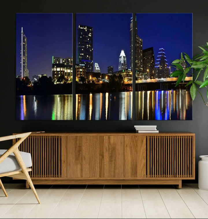 The Austin Lights Night Blue Skyline Cityscape View wall art canvas print features a city skyline and river on museum-quality canvas. It offers the perfect ready-to-hang solution that transforms any room into an urban oasis.