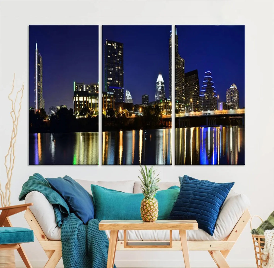 The Austin Lights Night Blue Skyline Cityscape View wall art canvas print features a city skyline and river on museum-quality canvas. It offers the perfect ready-to-hang solution that transforms any room into an urban oasis.