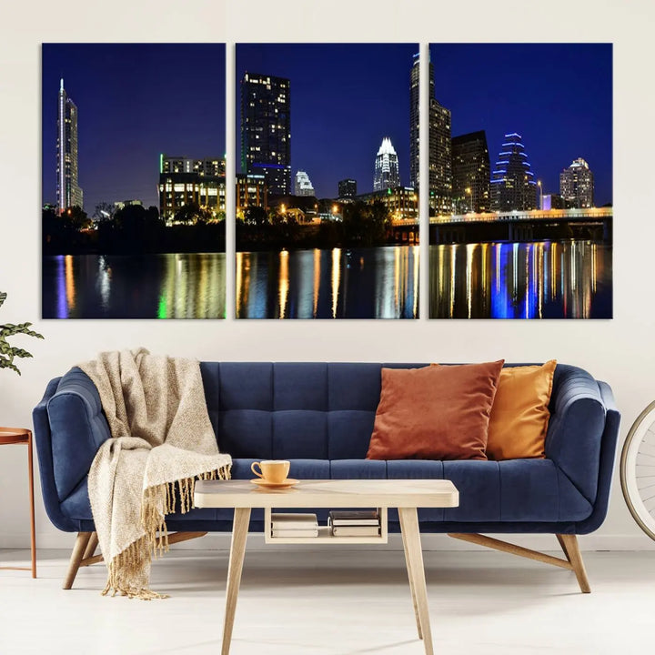 The Austin Lights Night Blue Skyline Cityscape View wall art canvas print features a city skyline and river on museum-quality canvas. It offers the perfect ready-to-hang solution that transforms any room into an urban oasis.