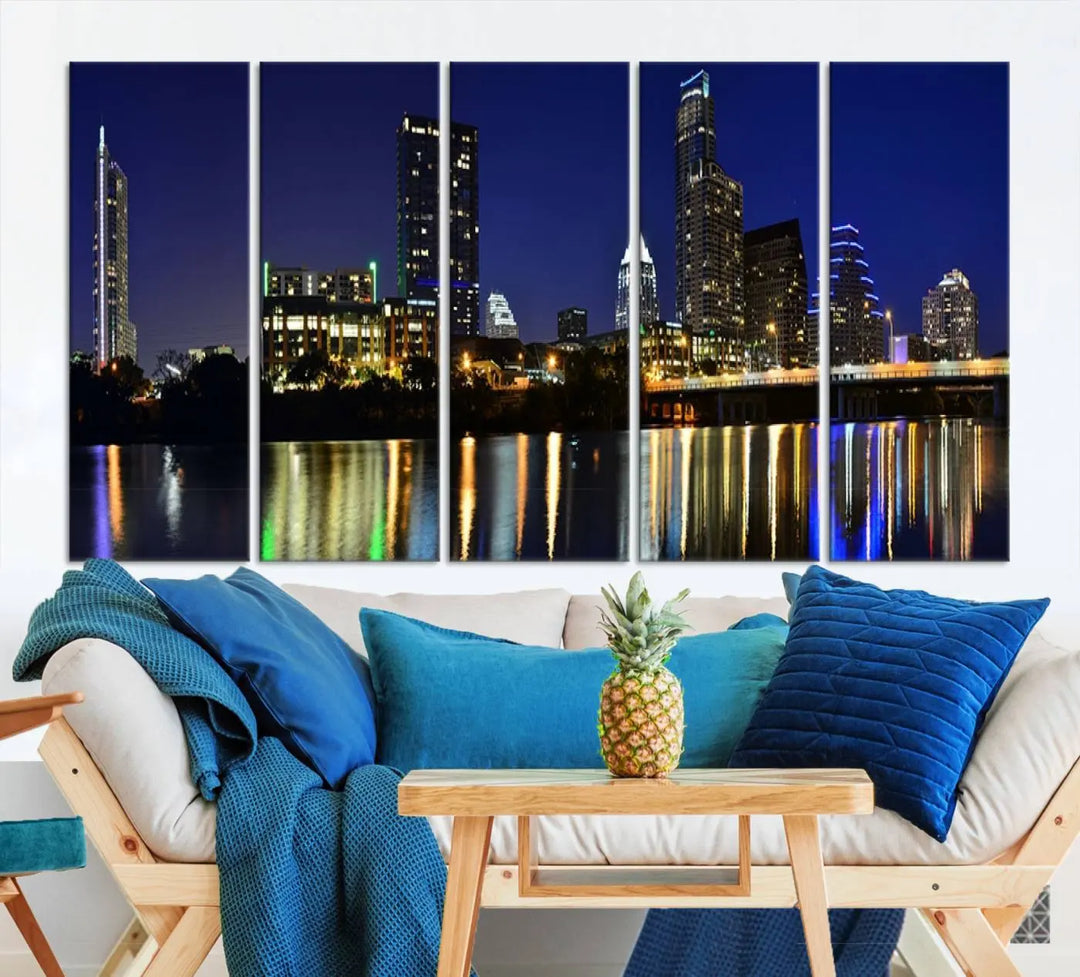 The Austin Lights Night Blue Skyline Cityscape View wall art canvas print features a city skyline and river on museum-quality canvas. It offers the perfect ready-to-hang solution that transforms any room into an urban oasis.