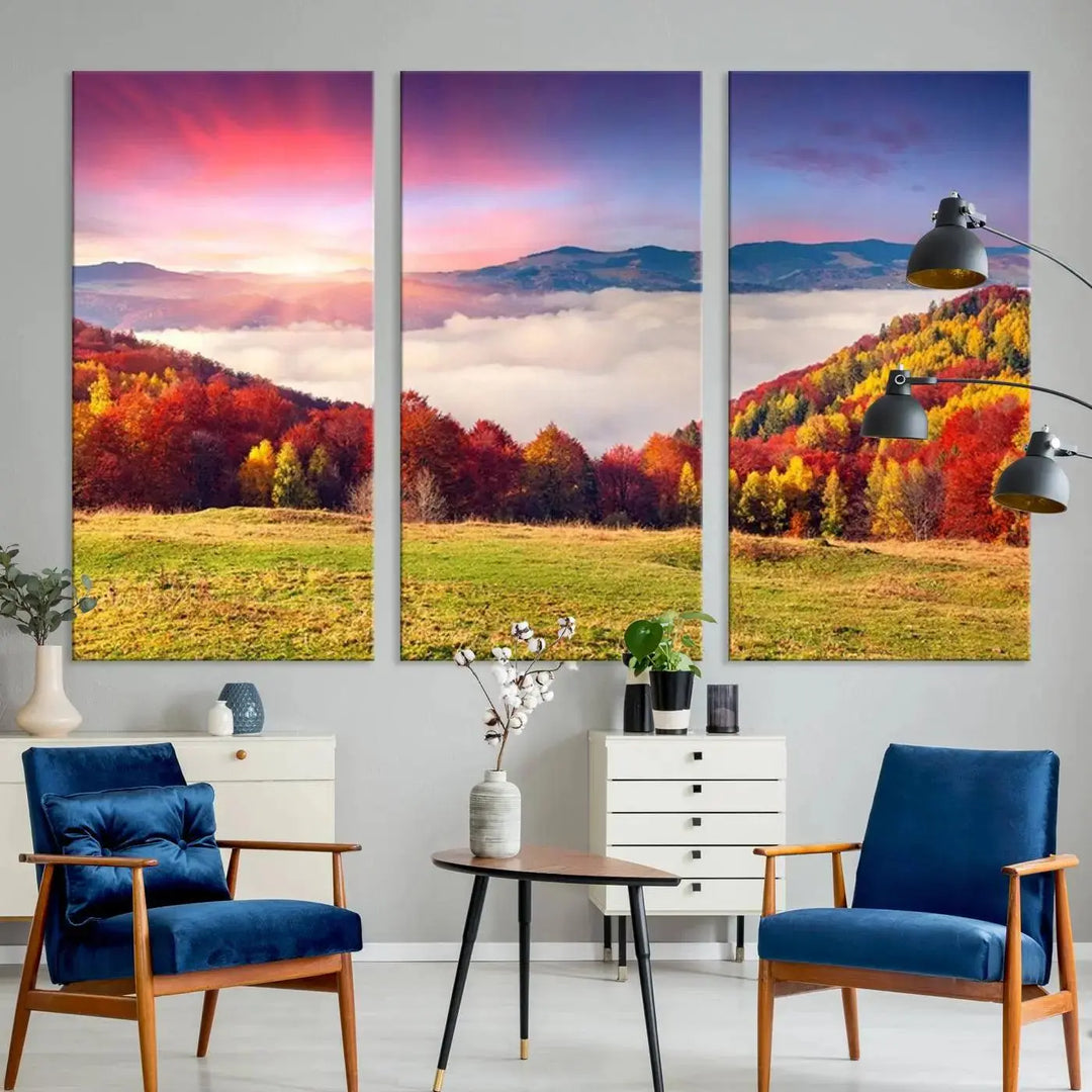 The triptych titled "Autumn Mountain Foggy Landscape Wall Art Canvas Print" beautifully captures a vibrant autumn scene with colorful trees and mountains, adding a striking touch to the modern living room.