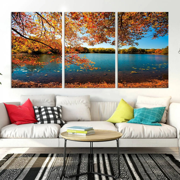 Experience the stunning *Autumn Tree Fall Lake Wall Art Canvas Print* featuring a triptych of autumn leaves over a lake, mounted on museum-quality canvases. Enjoy free shipping when you order this exquisite piece for your space.