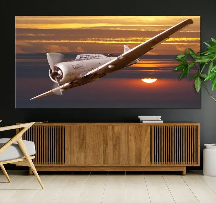 The Avi Wall Art Airplane on Sunset Canvas Print showcases a vintage airplane soaring at sunset across three panels. Crafted on museum-quality canvases with UV-protective coating, it is designed to preserve its timeless beauty.