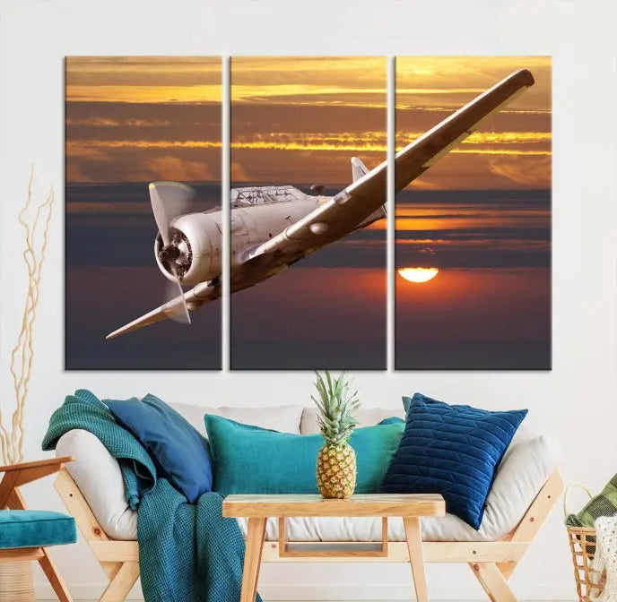 The Avi Wall Art Airplane on Sunset Canvas Print showcases a vintage airplane soaring at sunset across three panels. Crafted on museum-quality canvases with UV-protective coating, it is designed to preserve its timeless beauty.