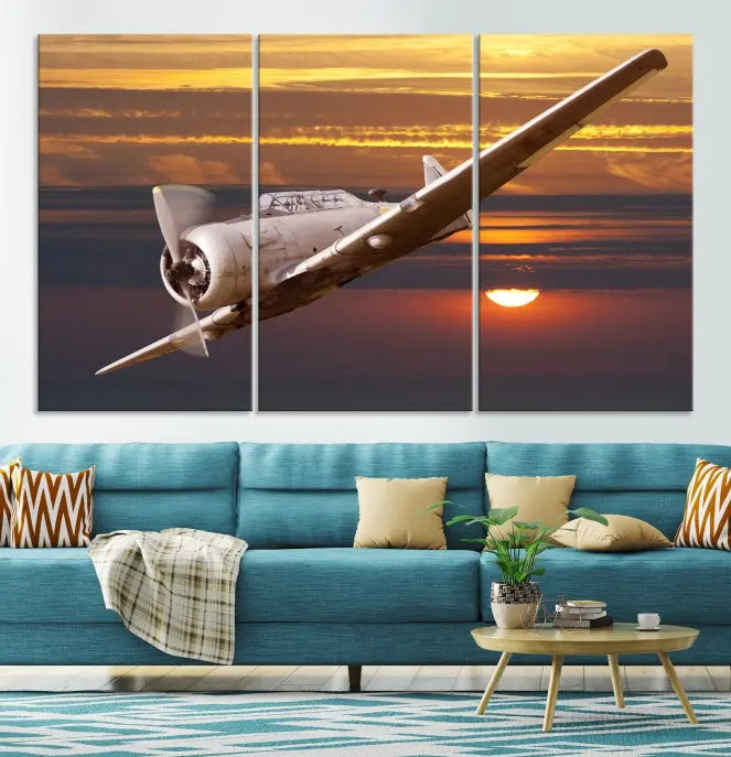 The Avi Wall Art Airplane on Sunset Canvas Print showcases a vintage airplane soaring at sunset across three panels. Crafted on museum-quality canvases with UV-protective coating, it is designed to preserve its timeless beauty.