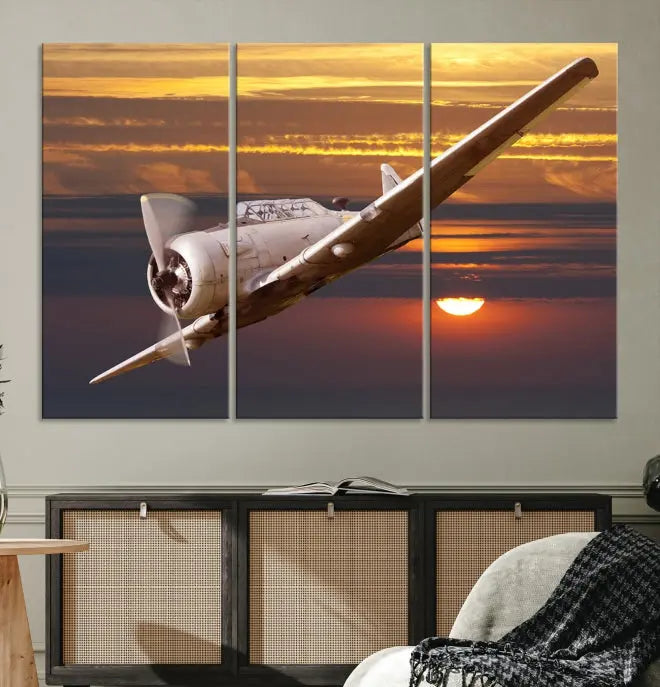 The Avi Wall Art Airplane on Sunset Canvas Print showcases a vintage airplane soaring at sunset across three panels. Crafted on museum-quality canvases with UV-protective coating, it is designed to preserve its timeless beauty.