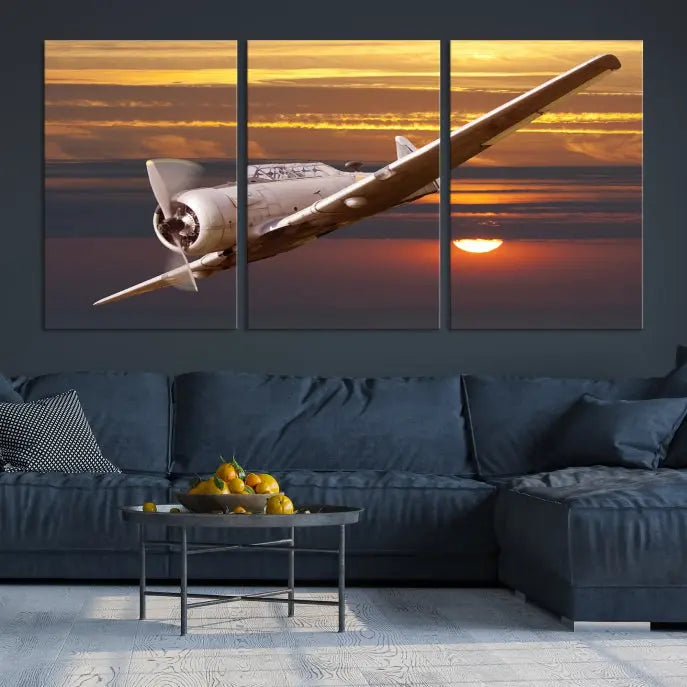 The Avi Wall Art Airplane on Sunset Canvas Print showcases a vintage airplane soaring at sunset across three panels. Crafted on museum-quality canvases with UV-protective coating, it is designed to preserve its timeless beauty.