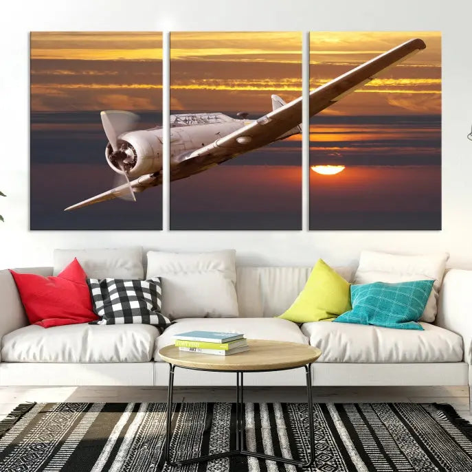 The Avi Wall Art Airplane on Sunset Canvas Print showcases a vintage airplane soaring at sunset across three panels. Crafted on museum-quality canvases with UV-protective coating, it is designed to preserve its timeless beauty.