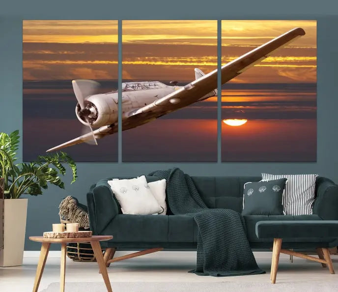 The Avi Wall Art Airplane on Sunset Canvas Print showcases a vintage airplane soaring at sunset across three panels. Crafted on museum-quality canvases with UV-protective coating, it is designed to preserve its timeless beauty.