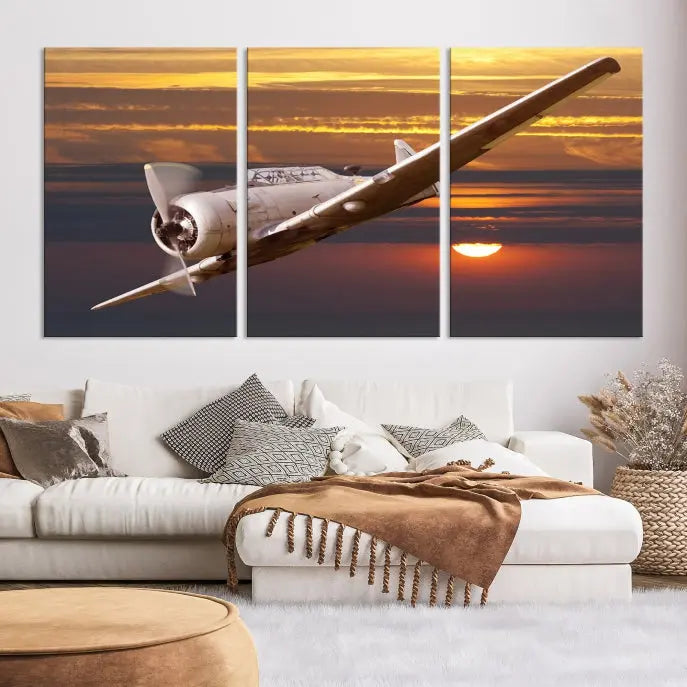 The Avi Wall Art Airplane on Sunset Canvas Print showcases a vintage airplane soaring at sunset across three panels. Crafted on museum-quality canvases with UV-protective coating, it is designed to preserve its timeless beauty.