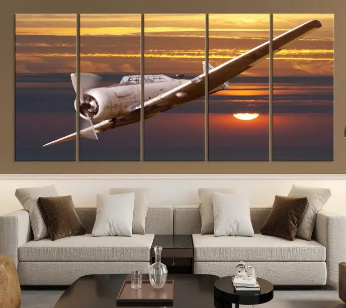 The Avi Wall Art Airplane on Sunset Canvas Print showcases a vintage airplane soaring at sunset across three panels. Crafted on museum-quality canvases with UV-protective coating, it is designed to preserve its timeless beauty.