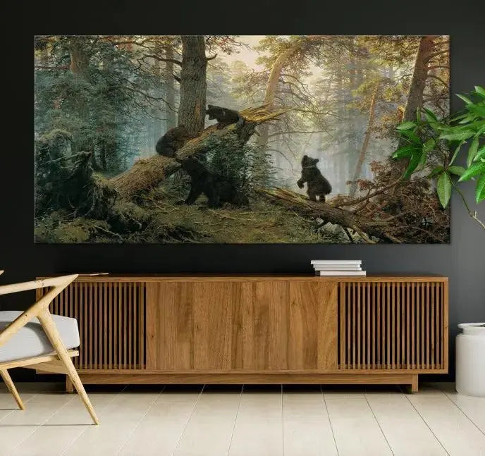 The "Baby Bears in Forest Wall Art Canvas Print" is a triptych featuring bears amidst a dense forest setting. It is crafted on museum-quality polycotton with a UV-protective coating, ensuring lasting vibrancy and detail.