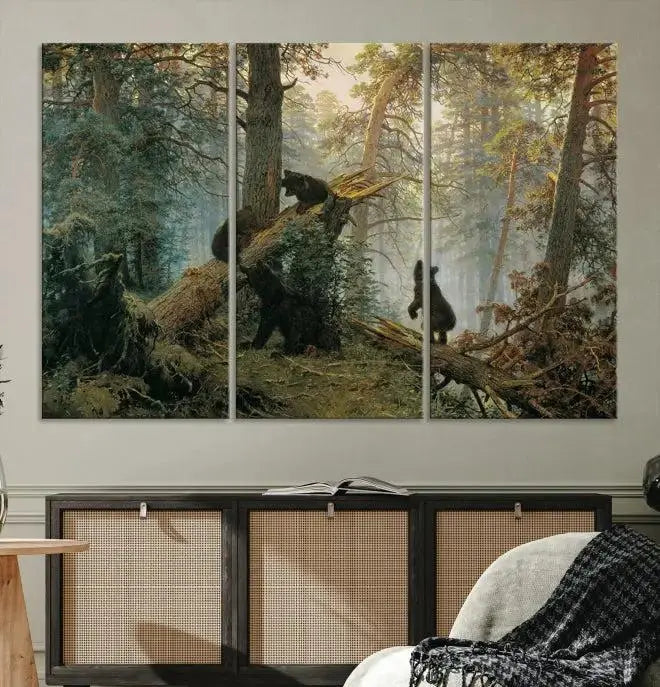 The "Baby Bears in Forest Wall Art Canvas Print" is a triptych featuring bears amidst a dense forest setting. It is crafted on museum-quality polycotton with a UV-protective coating, ensuring lasting vibrancy and detail.