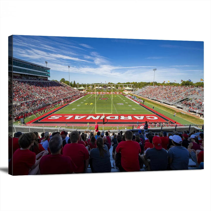 Experience a gallery-quality finish with the Ball State Cardinals Football Team Print - Muncie Scheumann Stadium Wall Art Canvas Print. This piece features a three-panel depiction of the stadium and its lively crowd from the stands, adding a dynamic touch to any modern living room setting.