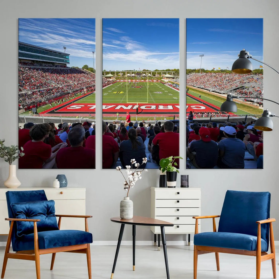 Experience a gallery-quality finish with the Ball State Cardinals Football Team Print - Muncie Scheumann Stadium Wall Art Canvas Print. This piece features a three-panel depiction of the stadium and its lively crowd from the stands, adding a dynamic touch to any modern living room setting.