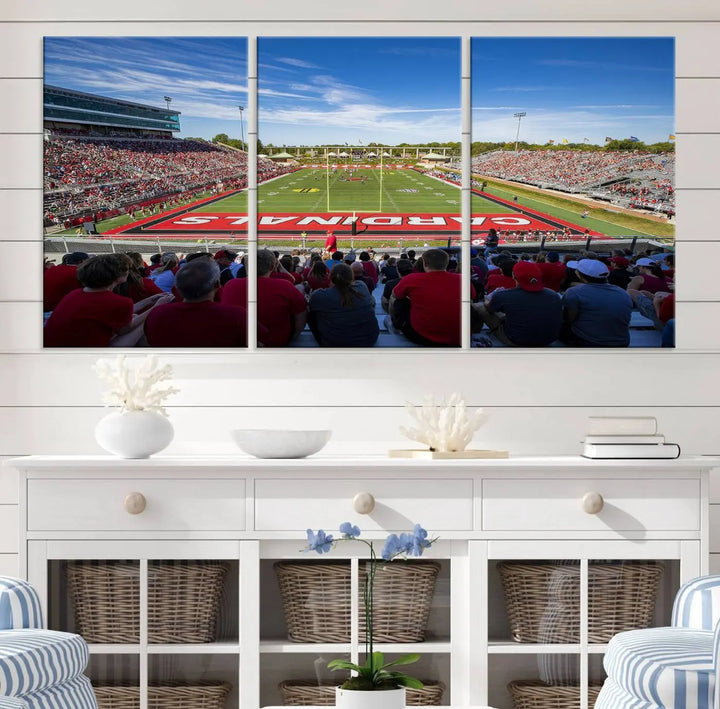 Experience a gallery-quality finish with the Ball State Cardinals Football Team Print - Muncie Scheumann Stadium Wall Art Canvas Print. This piece features a three-panel depiction of the stadium and its lively crowd from the stands, adding a dynamic touch to any modern living room setting.