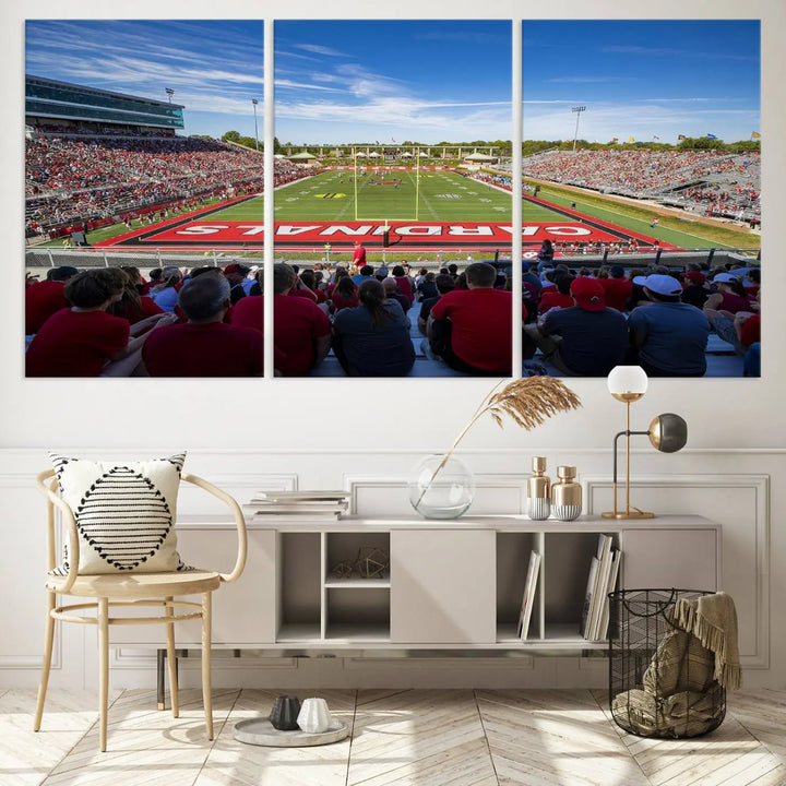 Experience a gallery-quality finish with the Ball State Cardinals Football Team Print - Muncie Scheumann Stadium Wall Art Canvas Print. This piece features a three-panel depiction of the stadium and its lively crowd from the stands, adding a dynamic touch to any modern living room setting.