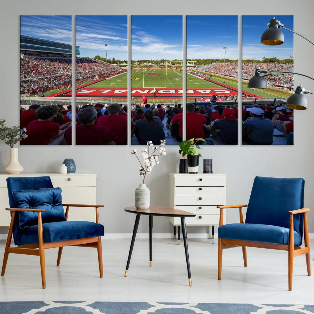 Experience a gallery-quality finish with the Ball State Cardinals Football Team Print - Muncie Scheumann Stadium Wall Art Canvas Print. This piece features a three-panel depiction of the stadium and its lively crowd from the stands, adding a dynamic touch to any modern living room setting.