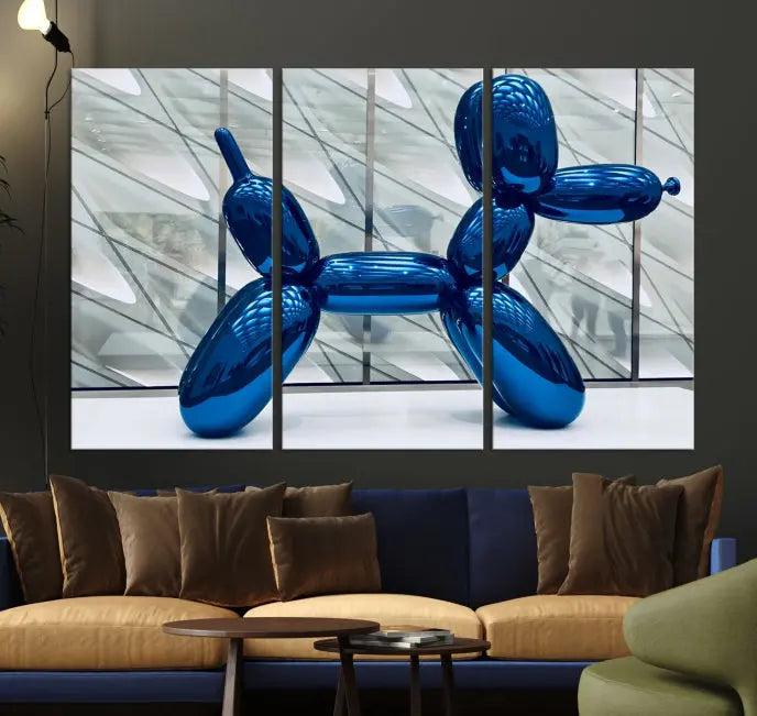 The Balloon Dog Wall Art Canvas Print features a triptych of a shiny blue balloon dog sculpture. This museum-quality artwork showcases gallery-wrapped edges and includes a UV-protective coating to ensure long-lasting brilliance.