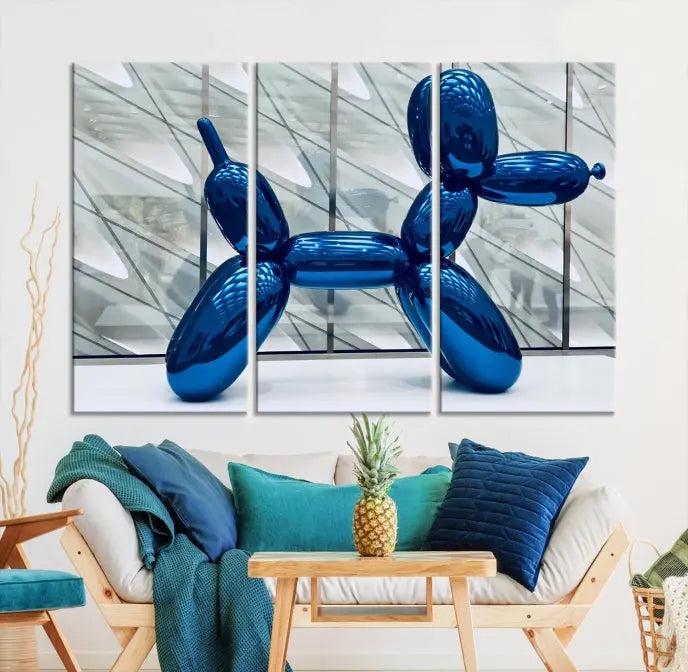 The Balloon Dog Wall Art Canvas Print features a triptych of a shiny blue balloon dog sculpture. This museum-quality artwork showcases gallery-wrapped edges and includes a UV-protective coating to ensure long-lasting brilliance.