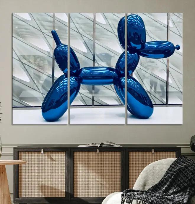 The Balloon Dog Wall Art Canvas Print features a triptych of a shiny blue balloon dog sculpture. This museum-quality artwork showcases gallery-wrapped edges and includes a UV-protective coating to ensure long-lasting brilliance.