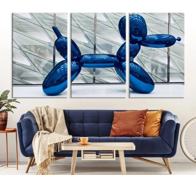 The Balloon Dog Wall Art Canvas Print features a triptych of a shiny blue balloon dog sculpture. This museum-quality artwork showcases gallery-wrapped edges and includes a UV-protective coating to ensure long-lasting brilliance.