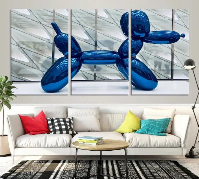 The Balloon Dog Wall Art Canvas Print features a triptych of a shiny blue balloon dog sculpture. This museum-quality artwork showcases gallery-wrapped edges and includes a UV-protective coating to ensure long-lasting brilliance.