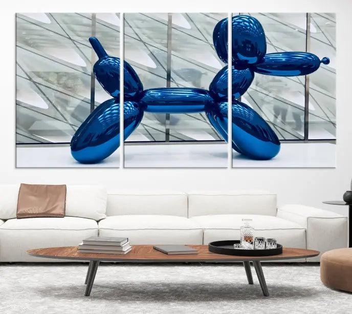 The Balloon Dog Wall Art Canvas Print features a triptych of a shiny blue balloon dog sculpture. This museum-quality artwork showcases gallery-wrapped edges and includes a UV-protective coating to ensure long-lasting brilliance.