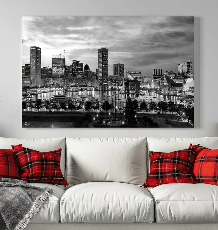 The "Baltimore City Cloudy Skyline Black and White Wall Art Canvas Print," crafted on museum-quality canvases with a UV-protective coating, elegantly adorns the dark wall. Ready to hang, it adds an elegant touch to any room.