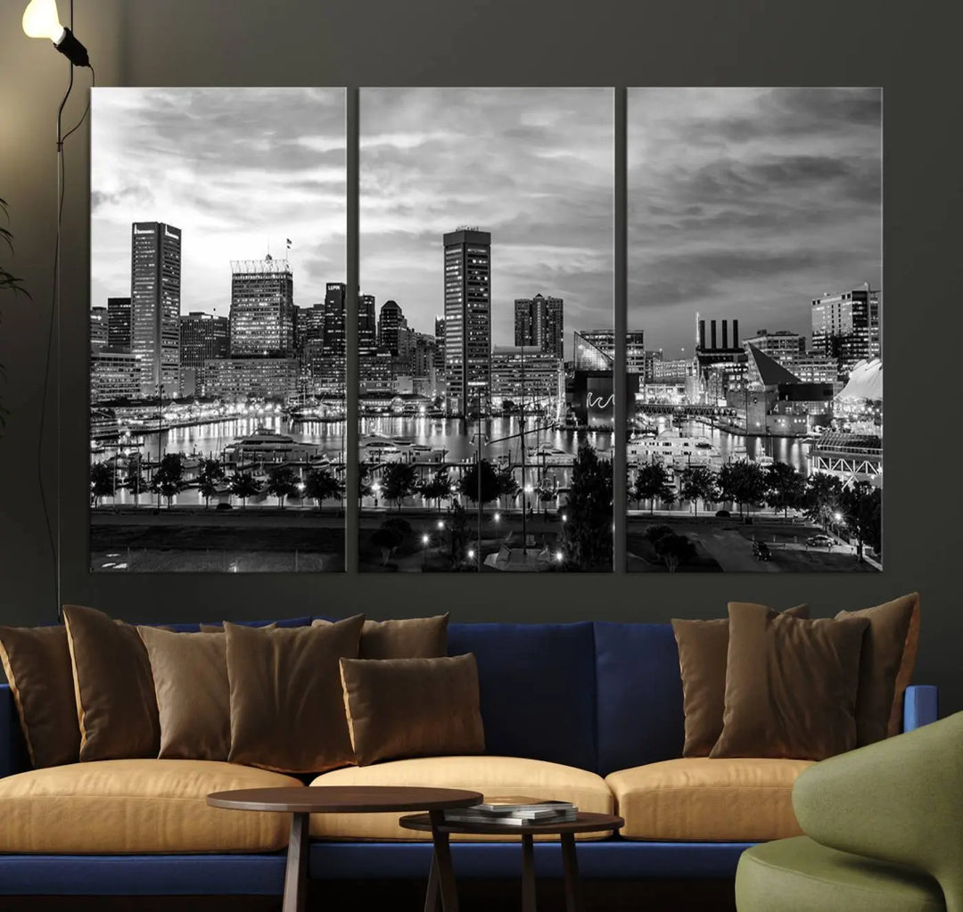 The "Baltimore City Cloudy Skyline Black and White Wall Art Canvas Print," crafted on museum-quality canvases with a UV-protective coating, elegantly adorns the dark wall. Ready to hang, it adds an elegant touch to any room.