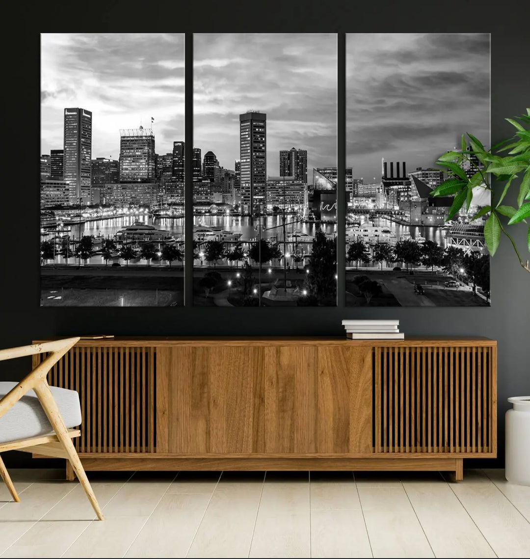 The "Baltimore City Cloudy Skyline Black and White Wall Art Canvas Print," crafted on museum-quality canvases with a UV-protective coating, elegantly adorns the dark wall. Ready to hang, it adds an elegant touch to any room.