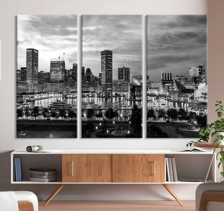 The "Baltimore City Cloudy Skyline Black and White Wall Art Canvas Print," crafted on museum-quality canvases with a UV-protective coating, elegantly adorns the dark wall. Ready to hang, it adds an elegant touch to any room.