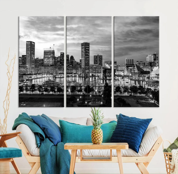 The "Baltimore City Cloudy Skyline Black and White Wall Art Canvas Print," crafted on museum-quality canvases with a UV-protective coating, elegantly adorns the dark wall. Ready to hang, it adds an elegant touch to any room.