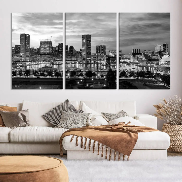 The "Baltimore City Cloudy Skyline Black and White Wall Art Canvas Print," crafted on museum-quality canvases with a UV-protective coating, elegantly adorns the dark wall. Ready to hang, it adds an elegant touch to any room.