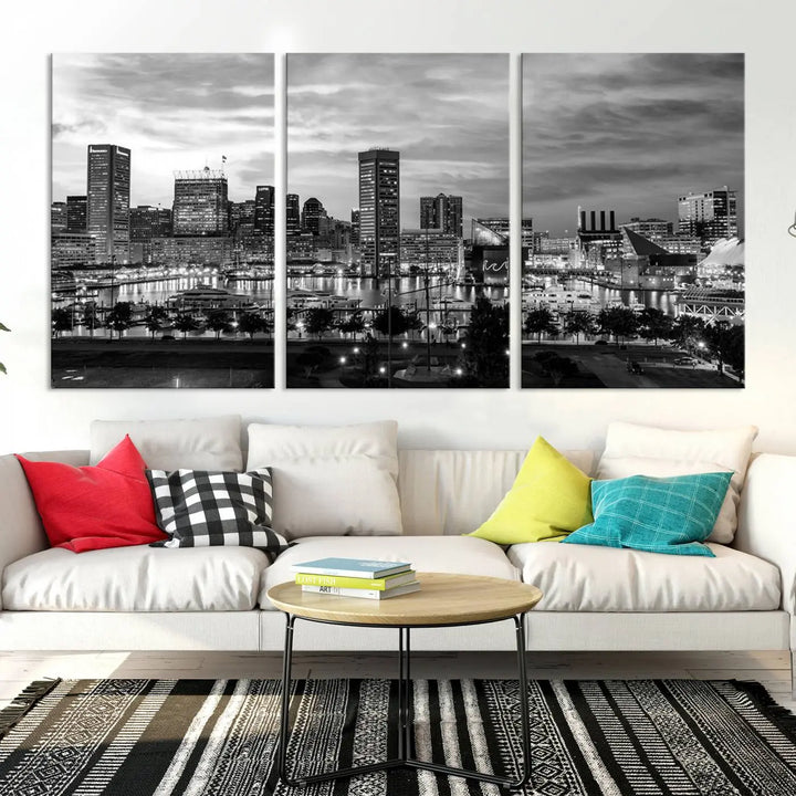 The "Baltimore City Cloudy Skyline Black and White Wall Art Canvas Print," crafted on museum-quality canvases with a UV-protective coating, elegantly adorns the dark wall. Ready to hang, it adds an elegant touch to any room.