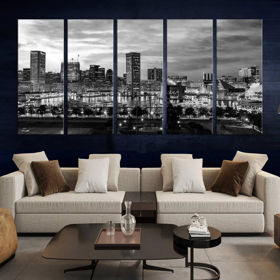 The "Baltimore City Cloudy Skyline Black and White Wall Art Canvas Print," crafted on museum-quality canvases with a UV-protective coating, elegantly adorns the dark wall. Ready to hang, it adds an elegant touch to any room.