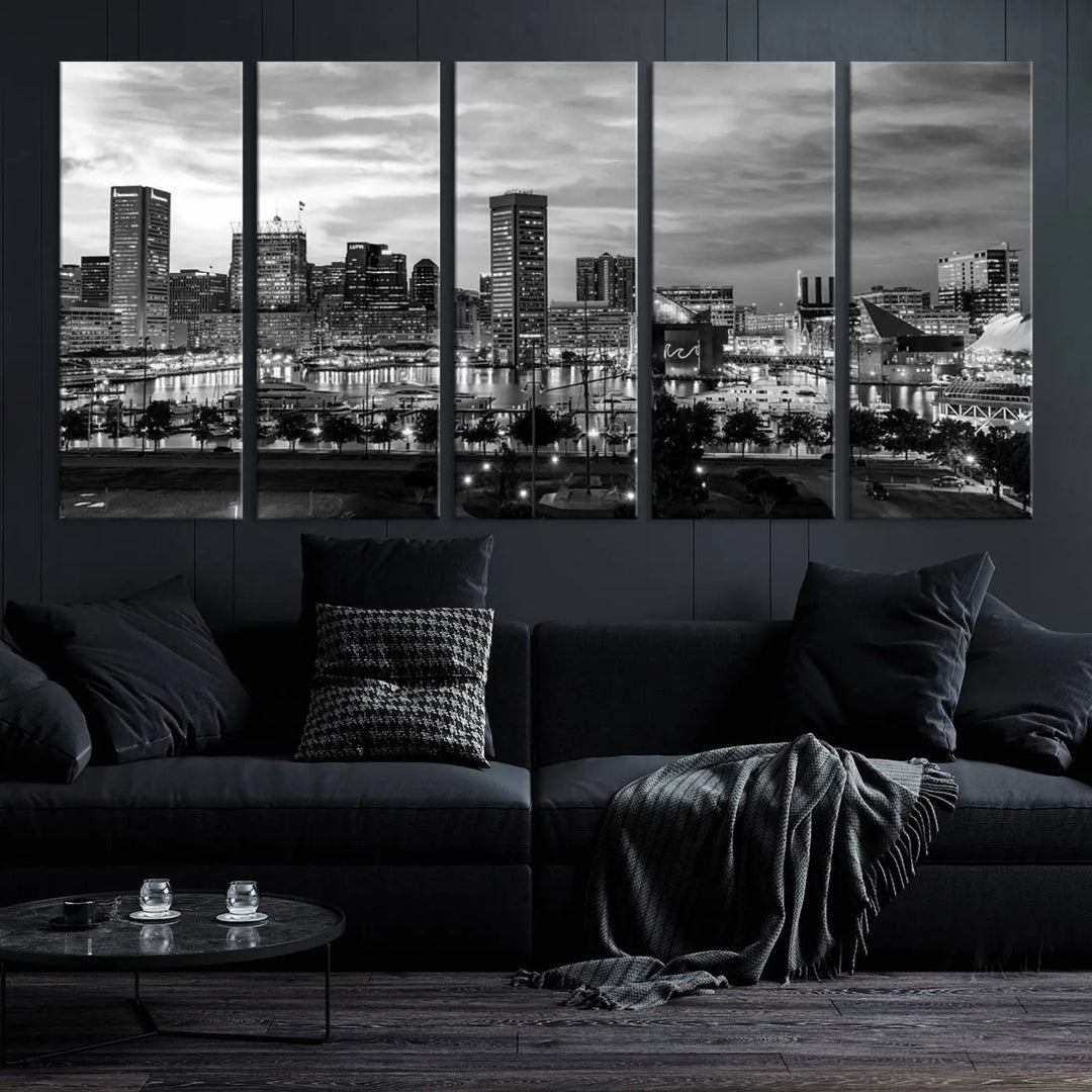 The "Baltimore City Cloudy Skyline Black and White Wall Art Canvas Print," crafted on museum-quality canvases with a UV-protective coating, elegantly adorns the dark wall. Ready to hang, it adds an elegant touch to any room.