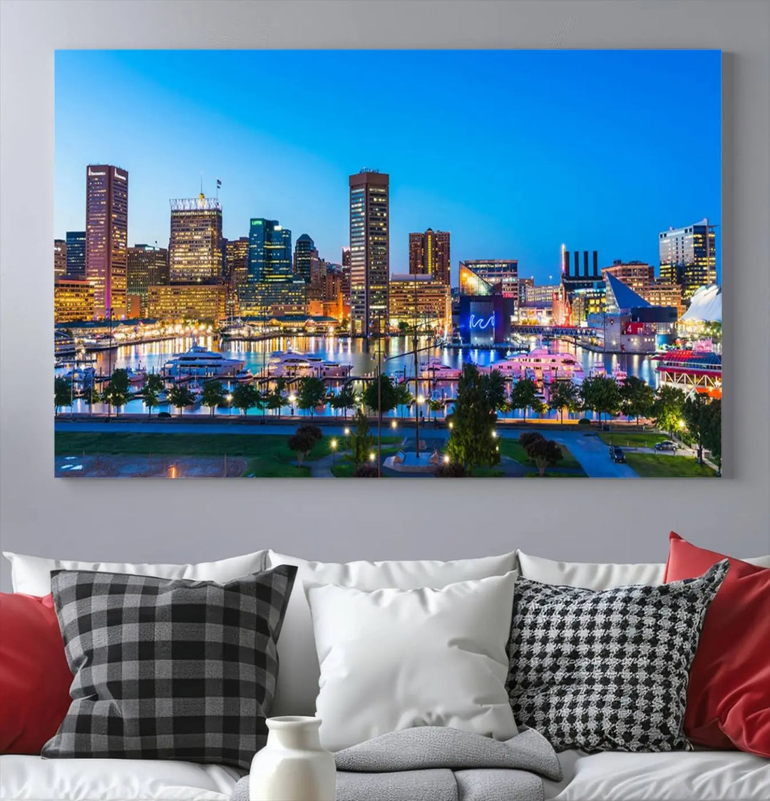 The Baltimore City Lights Blue Skyline Cityscape View Wall Art Canvas Print, a three-panel depiction of a city skyline at dusk on museum-quality canvas, adorns the area, showcasing an elegant evening cityscape.