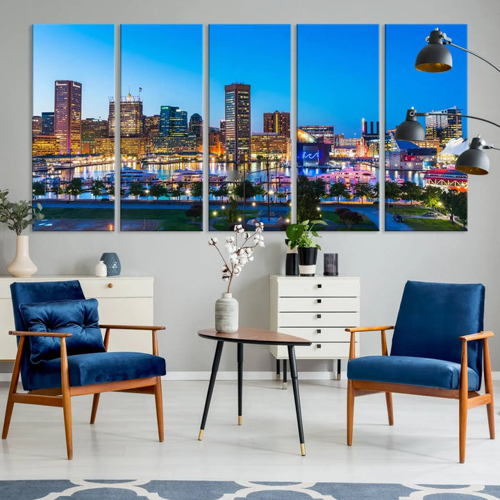 The Baltimore City Lights Blue Skyline Cityscape View Wall Art Canvas Print, a three-panel depiction of a city skyline at dusk on museum-quality canvas, adorns the area, showcasing an elegant evening cityscape.