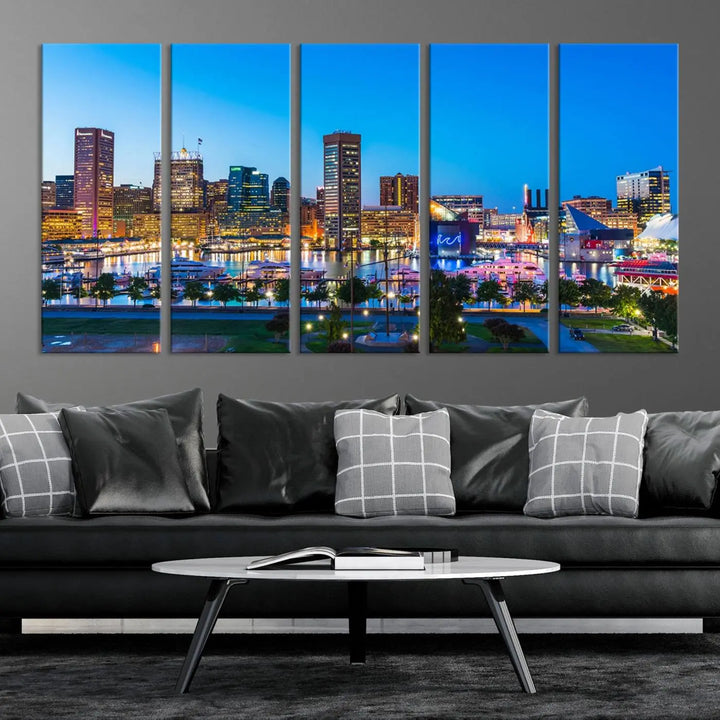 The Baltimore City Lights Blue Skyline Cityscape View Wall Art Canvas Print, a three-panel depiction of a city skyline at dusk on museum-quality canvas, adorns the area, showcasing an elegant evening cityscape.